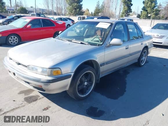 1991 Honda Accord LX z VIN JHMCB7652MC035838, wystawiony jako IAAI lot #41329502 z przebiegiem 176 816 mil mil oraz . Historia ofert i sprzedaży dostępna na DreamBid. Obrazek 2.