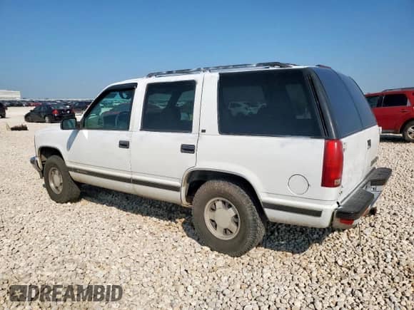 1997 Chevrolet Tahoe Police Special с VIN 1GNEC13R6VJ363750, выставлен на аукционе Copart как лот 70567575 с пробегом 80 745 миль миль и Списание • Salvage title. История ставок и продаж доступна на DreamBid. Изображение 2.