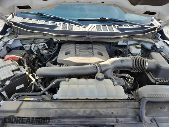 2023 Ford F-150 Lariat with VIN 1FTFW1E89PFA91516, listed as a Copart auction lot 61666315 with 65,711 mi miles and Salvage title. Bid and sale history available at DreamBid. Image 11.