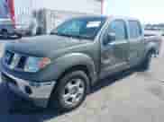 2005 Nissan Frontier SE with VIN 1N6AD07U95C419128, listed as a IAAI auction lot 42953188 with 198,492 mi miles and . Bid and sale history available at DreamBid. Image 2.