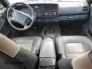 2000 Dodge Durango z VIN 1B4HS28Z8YF262768, wystawiony jako Copart lot #79917924 z przebiegiem 197 039 mil mil oraz Szkoda całkowita • Salvage title. Historia ofert i sprzedaży dostępna na DreamBid. Obrazek 8.