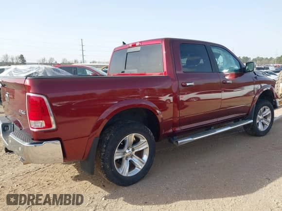 2017 Ram 1500 Laramie with VIN 1C6RR7NM4HS875347, listed as a IAAI auction lot 41826432 with 103,127 mi miles and . Bid and sale history available at DreamBid. Image 4.