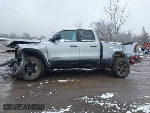 2019 Ram 1500 Rebel with VIN 1C6RRFEG1KN822602, listed as a IAAI auction lot 41156572 with 74,016 mi miles and . Bid and sale history available at DreamBid. Image 14.