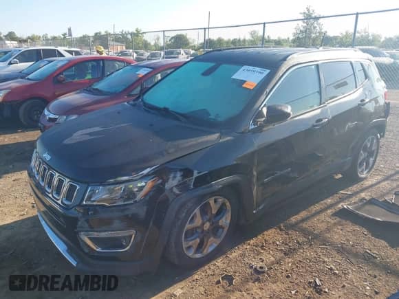 2019 Jeep Compass Limited with VIN 3C4NJDCBXKT679305, listed as a IAAI auction lot 43059390 with 59,547 mi miles and . Bid and sale history available at DreamBid. Image 2.
