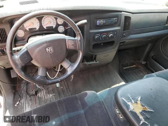 2004 Dodge 1500 SLT z VIN 1D7HA16D94J198888, wystawiony jako Copart lot #65046655 z przebiegiem 183 860 mil mil oraz Szkoda całkowita • Salvage title. Historia ofert i sprzedaży dostępna na DreamBid. Obrazek 8.