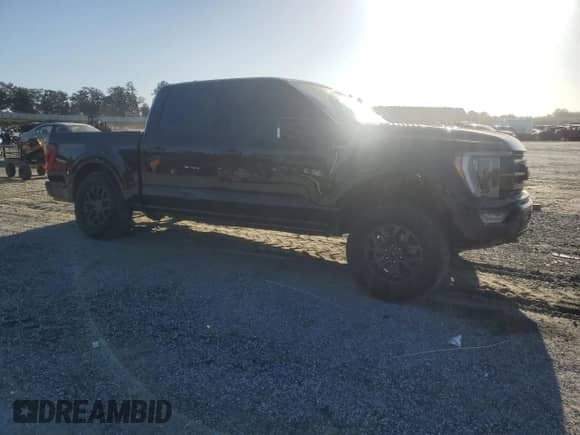 2022 Ford F-150 XL с VIN 1FTEW1E83NFA00703, выставлен на аукционе Copart как лот 85178715 с пробегом 98 584 миль миль и Списание • Salvage title. История ставок и продаж доступна на DreamBid. Изображение 4.