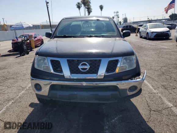 2009 Nissan Frontier SE with VIN 1N6AD07U89C422429, listed as a Copart auction lot 58546945 with 140,325 mi miles and Salvage title. Bid and sale history available at DreamBid. Image 5.