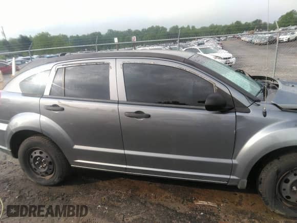 2011 Dodge Caliber z VIN 1B3CB1HA1BD254341, wystawiony jako IAAI lot #42113044 z przebiegiem 296 415 mil mil oraz . Historia ofert i sprzedaży dostępna na DreamBid. Obrazek 13.