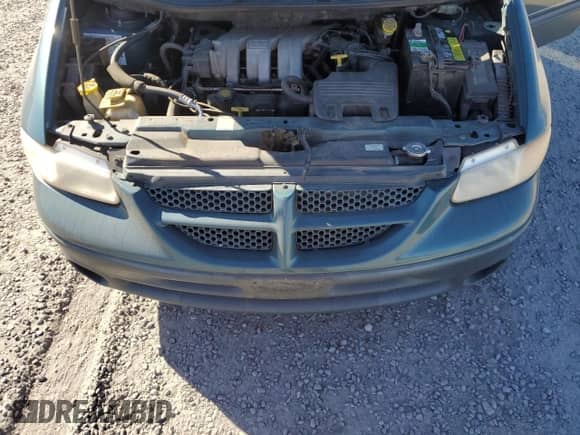 2000 Dodge Caravan with VIN 1B4GP54G8YB665501, listed as a Copart auction lot 73558554 with 223,855 mi miles and Salvage title. Bid and sale history available at DreamBid. Image 12.