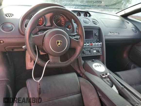 2012 Lamborghini Gallardo with VIN ZHWGU6BZ7CLA11933, listed as a Copart auction lot 74679154 with Not provided miles and Salvage title. Bid and sale history available at DreamBid. Image 8.