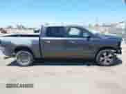 2019 Ram 1500 Laramie with VIN 1C6RREJT3KN894303, listed as a IAAI auction lot 42642439 with 84,379 mi miles and . Bid and sale history available at DreamBid. Image 14.