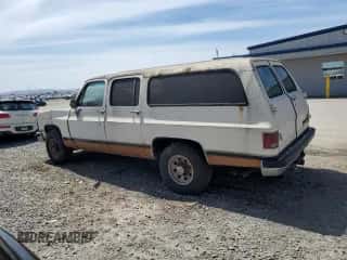 1989 Chevrolet Suburban с VIN 1GNGR26N6KF150544, выставлен на аукционе Copart как лот 50469335 с пробегом 21 480 миль миль и Чистый • Clean title. История ставок и продаж доступна на DreamBid. Изображение 2.