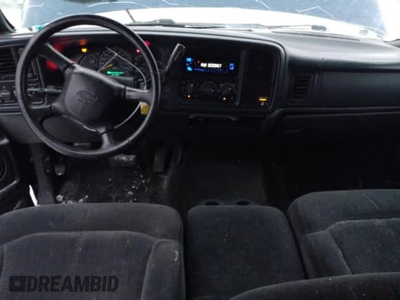 2001 Chevrolet Silverado 1500 LS z VIN 1GCEK19V61E191514, wystawiony jako Copart lot #81968884 z przebiegiem 156 785 mil mil oraz Szkoda całkowita • Salvage title. Historia ofert i sprzedaży dostępna na DreamBid. Obrazek 8.