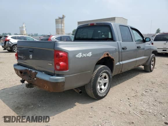 2005 Dodge Dakota ST с VIN 1D7HW28N15S237031, выставлен на аукционе Copart как лот 67138465 с пробегом 222 592 миль миль и Списание • Salvage title. История ставок и продаж доступна на DreamBid. Изображение 3.