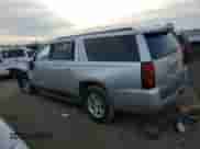 2018 Chevrolet Suburban LT z VIN 1GNSCHKCXJR332103, wystawiony jako Copart lot #82861393 z przebiegiem 143 607 mil mil oraz . Historia ofert i sprzedaży dostępna na DreamBid. Obrazek 2.