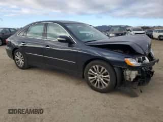 2011 Hyundai Azera Limited с VIN KMHFC4DF3BA559168, выставлен на аукционе Copart как лот 78522114 с пробегом 255 666 миль миль и Списание • Salvage title. История ставок и продаж доступна на DreamBid. Изображение 4.