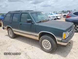 1993 Chevrolet Blazer с VIN 1GNDT13W2P2111444, выставлен на аукционе Copart как лот 61199575 с пробегом 177 604 миль миль и Чистый • Clean title. История ставок и продаж доступна на DreamBid. Изображение 4.