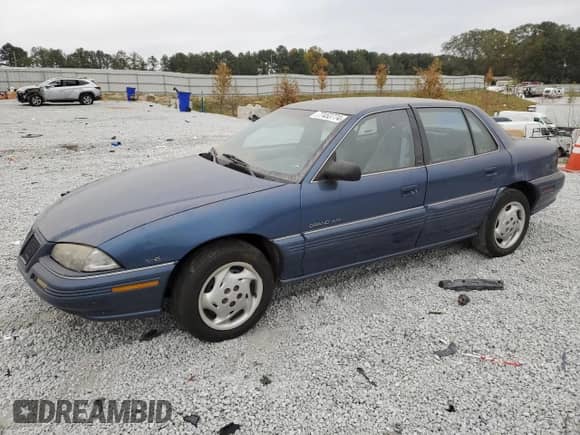 1995 Pontiac Grand Am с VIN 1G2NE55M1SC731915, выставлен на аукционе Copart как лот 77453774 с пробегом 170 080 миль миль и Списание • Salvage title. История ставок и продаж доступна на DreamBid. Изображение 1.