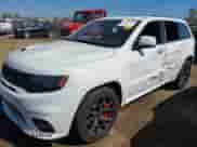2018 Jeep Grand Cherokee SRT z VIN 1C4RJFDJ8JC157091, wystawiony jako IAAI lot #43220203 z przebiegiem 54 593 mil mil oraz . Historia ofert i sprzedaży dostępna na DreamBid. Obrazek 2.