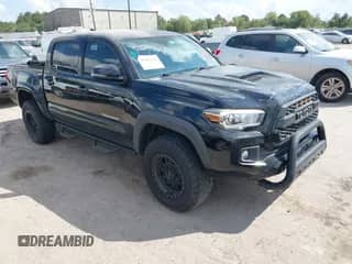 2018 Toyota Tacoma SR5 with VIN 5TFAZ5CN0JX055121, listed as a IAAI auction lot 43402426 with 178,992 mi miles and . Bid and sale history available at DreamBid. Image 1.