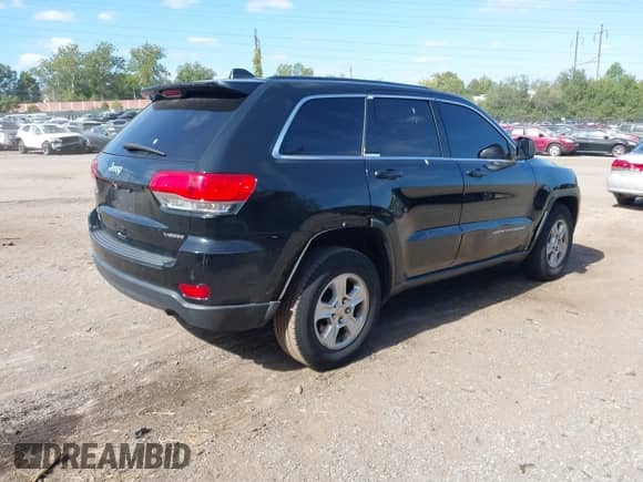 2014 Jeep Grand Cherokee Laredo z VIN 1C4RJFAGXEC255361, wystawiony jako IAAI lot #43383183 z przebiegiem 227 059 mil mil oraz . Historia ofert i sprzedaży dostępna na DreamBid. Obrazek 4.