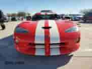 2002 Dodge Viper GTS with VIN 1B3ER69E22V102727, listed as a Copart auction lot 84859694 with 8,912 mi miles and Salvage title. Bid and sale history available at DreamBid. Image 5.