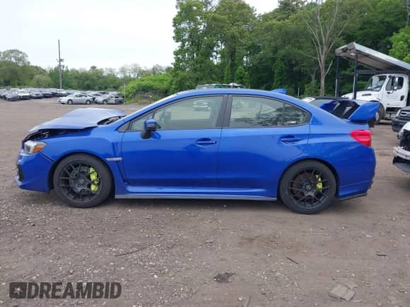 2020 Subaru WRX STI with VIN JF1VA2E61L9833954, listed as a IAAI auction lot 42336349 with 58,668 mi miles and . Bid and sale history available at DreamBid. Image 14.