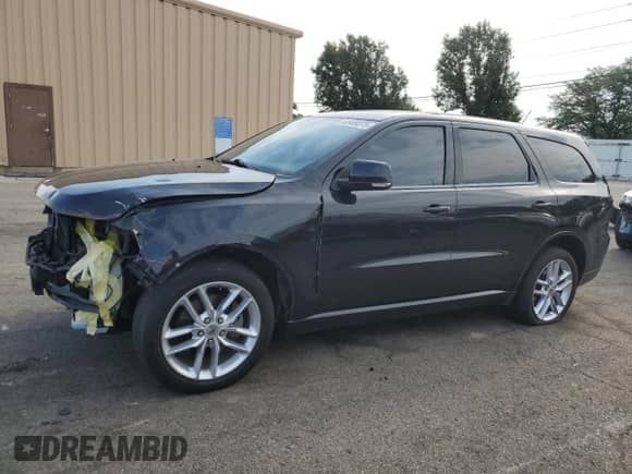 2013 Dodge Durango R/T with VIN 1C4SDJCT7DC696014, listed as a Copart auction lot 65469375 with 123,656 mi miles and Salvage title. Bid and sale history available at DreamBid. Image 1.