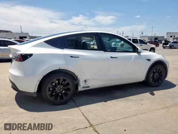 2023 Tesla Model Y Long Range with VIN 7SAYGDEE6PA130256, listed as a Copart auction lot 65733695 with 40,057 mi miles and Clean title. Bid and sale history available at DreamBid. Image 3.