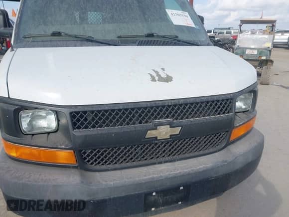 2015 Chevrolet Express Cargo with VIN 1GCWGGCF0F1184129, listed as a IAAI auction lot 42705530 with 185,687 mi miles and . Bid and sale history available at DreamBid. Image 6.