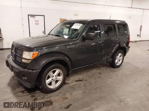 2011 Dodge Nitro SXT with VIN 1D4PU5GK4BW549310, listed as a IAAI auction lot 43170636 with 187,066 mi miles and . Bid and sale history available at DreamBid. Image 2.