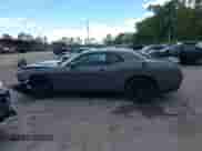 2018 Dodge Challenger T/A with VIN 2C3CDZBTXJH311594, listed as a IAAI auction lot 43202742 with 76,854 mi miles and . Bid and sale history available at DreamBid. Image 14.