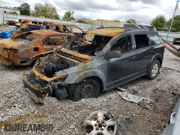 2012 Dodge Journey American Value z VIN 3C4PDCABXCT355432, wystawiony jako Copart lot #83928665 z przebiegiem Nie podano mil oraz Szkoda całkowita • Salvage title. Historia ofert i sprzedaży dostępna na DreamBid. Obrazek 1.