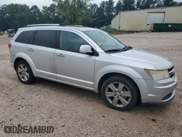 2011 Dodge Journey LUX с VIN 3D4PG9FG5BT513448, выставлен на аукционе Copart как лот 64300475 с пробегом 214 602 миль миль и Чистый • Clean title. История ставок и продаж доступна на DreamBid. Изображение 4.