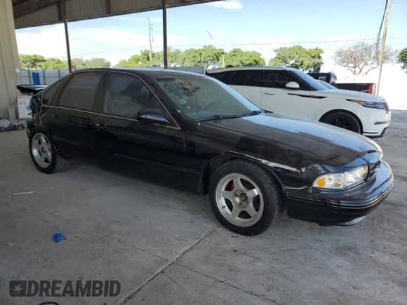 1996 Chevrolet Caprice 1SA Special Value с VIN 1G1BL52P2TR162969, выставлен на аукционе Copart как лот 64120355 с пробегом 157 218 миль миль и Списание • Salvage title. История ставок и продаж доступна на DreamBid. Изображение 4.