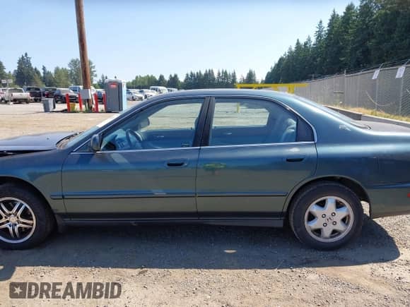 1996 Honda Accord EX z VIN 1HGCE6677TA011051, wystawiony jako IAAI lot #42819913 z przebiegiem 192 879 mil mil oraz . Historia ofert i sprzedaży dostępna na DreamBid. Obrazek 15.