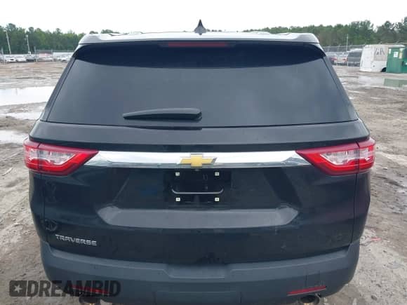 2021 Chevrolet Traverse LS z VIN 1GNERFKW0MJ244559, wystawiony jako IAAI lot #42461606 z przebiegiem 51 923 mil mil oraz . Historia ofert i sprzedaży dostępna na DreamBid. Obrazek 16.