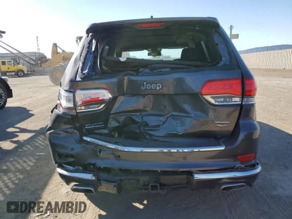 2014 Jeep Grand Cherokee Summit with VIN 1C4RJFJM6EC340672, listed as a Copart auction lot 71270735 with 49,538 mi miles and Salvage title. Bid and sale history available at DreamBid. Image 6.