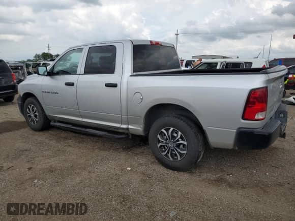 2012 Ram 1500 Tradesman with VIN 1C6RD7KP9CS154303, listed as a Copart auction lot 62102415 with 214,457 mi miles and Clean title. Bid and sale history available at DreamBid. Image 2.