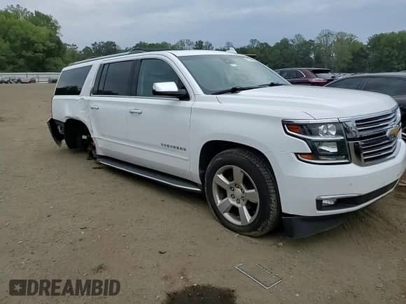 2017 Chevrolet Suburban Premier с VIN 1GNSKJKC5HR216909, выставлен на аукционе Copart как лот 81224145 с пробегом 147 585 миль миль и Списание • Salvage title. История ставок и продаж доступна на DreamBid. Изображение 14.