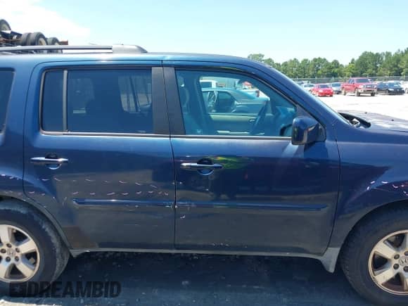 2011 Honda Pilot EX with VIN 5FNYF3H48BB047730, listed as a IAAI auction lot 43017334 with 175,000 mi miles and . Bid and sale history available at DreamBid. Image 13.