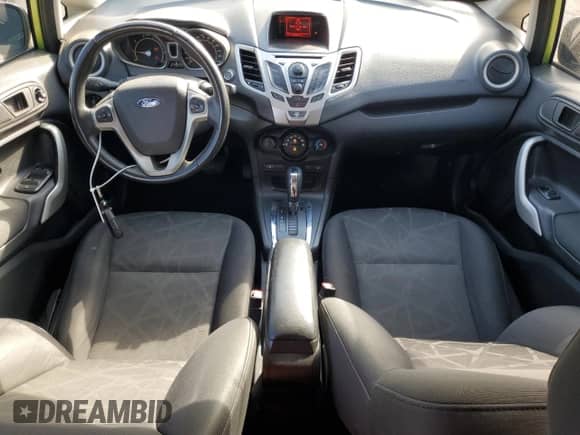 2011 Ford Fiesta SES with VIN 3FADP4FJ5BM157100, listed as a Copart auction lot 82081325 with 77,710 mi miles and Salvage title. Bid and sale history available at DreamBid. Image 8.