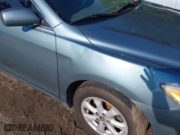 2010 Toyota Camry with VIN 4T1BF3EK4AU554831, listed as a IAAI auction lot 43217175 with 243,910 mi miles and . Bid and sale history available at DreamBid. Image 6.