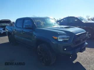 2020 Toyota Tacoma SR5 with VIN 5TFCZ5AN9LX229900, listed as a IAAI auction lot 41547099 with 125,369 mi miles and . Bid and sale history available at DreamBid. Image 1.