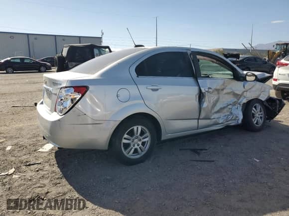 2015 Chevrolet Sonic LT с VIN 1G1JC5SB1F4184219, выставлен на аукционе Copart как лот 54556505 с пробегом 43 889 миль миль и Списание • Salvage title. История ставок и продаж доступна на DreamBid. Изображение 3.