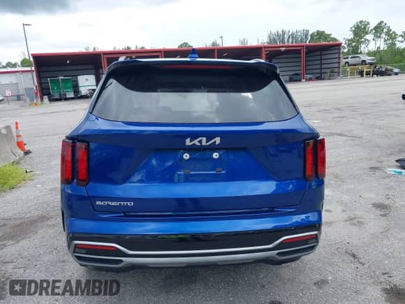 2023 Kia Sorento EX with VIN 5XYRH4LF6PG200313, listed as a IAAI auction lot 42635362 with 27,009 mi miles and . Bid and sale history available at DreamBid. Image 16.