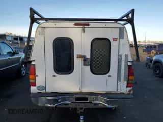 2000 Chevrolet Silverado 2500 LS с VIN 1GCGK24U7YE173174, выставлен на аукционе Copart как лот 86401474 с пробегом 238 917 миль миль и Списание • Salvage title. История ставок и продаж доступна на DreamBid. Изображение 6.