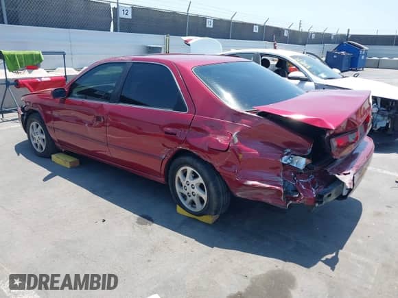 1997 Toyota Camry LE z VIN JT2BF22K9V0077628, wystawiony jako IAAI lot #42770453 z przebiegiem 257 721 mil mil oraz . Historia ofert i sprzedaży dostępna na DreamBid. Obrazek 3.