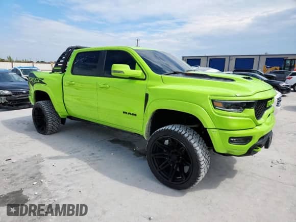 2023 Ram 1500 TRX z VIN 1C6SRFU94PN536609, wystawiony jako Copart lot #86865605 z przebiegiem 24 713 mil mil oraz Czysty tytuł • Clean title. Historia ofert i sprzedaży dostępna na DreamBid. Obrazek 4.