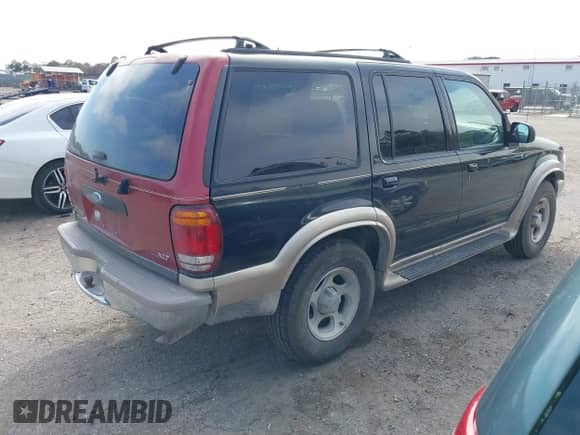 2000 Ford Explorer Eddie Bauer with VIN 1FMZU64EXYZA74923, listed as a IAAI auction lot 41504088 with 254,021 mi miles and . Bid and sale history available at DreamBid. Image 4.